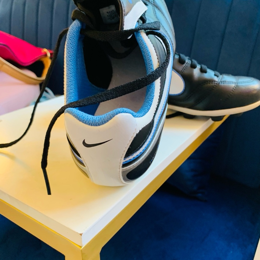 Nike Black and White Cleats with Blue Trim